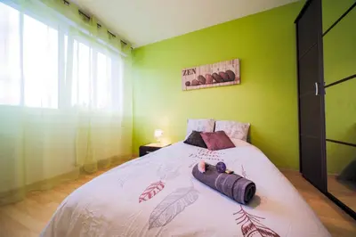 Un ou plusieurs lits dans un hébergement de l'établissement Appartement lumineux, 80m², proche des Vosges