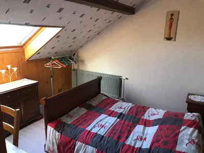 Un ou plusieurs lits dans un hébergement de l'établissement Gite du Château