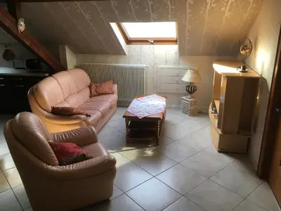 Coin salon dans l'établissement Gite du Château