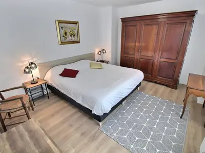 Un ou plusieurs lits dans un hébergement de l'établissement Appartement spacieux à Colmar avec terrasse, garage privatif, proche centre et gare - FR-1-722-2