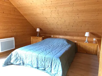 Un ou plusieurs lits dans un hébergement de l'établissement Chalet Myrtille