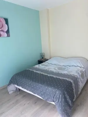 Un ou plusieurs lits dans un hébergement de l'établissement Gîte Auberge du fumoir