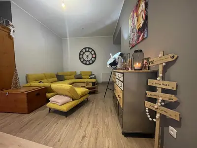 Coin salon dans l'établissement Aux grains de raisin - 6 personnes - cour privée