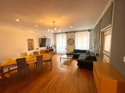 Télévision ou salle de divertissement dans l'établissement Spacious apartment in the heart of the center