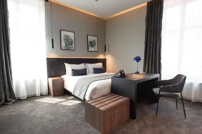 Un ou plusieurs lits dans un hébergement de l'établissement Best Western Premier Le Chapitre Hotel and Spa