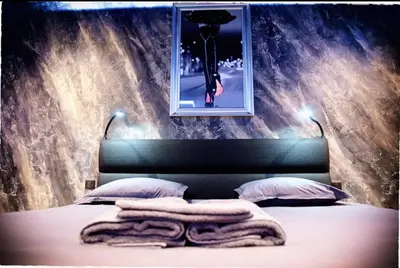 Un ou plusieurs lits dans un hébergement de l'établissement spa de la quarterelle LOVE ROOM 88 VOSGES