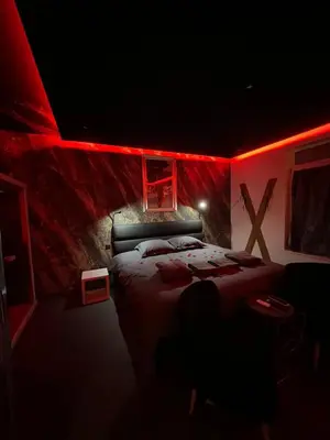 Un ou plusieurs lits dans un hébergement de l'établissement spa de la quarterelle LOVE ROOM 88 VOSGES