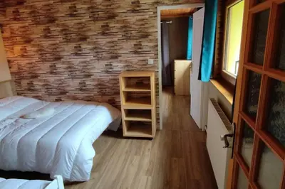 Un ou plusieurs lits dans un hébergement de l'établissement Maison de montagne vue magnifique