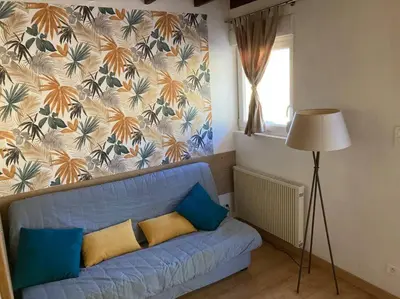 Coin salon dans l'établissement appart. Gérardmer - Le Rep'Air