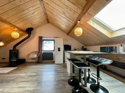 Cuisine ou kitchenette dans l'établissement Au Cocon du Haut Pergé