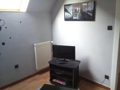 Télévision ou salle de divertissement dans l'établissement Gîte du vigneron