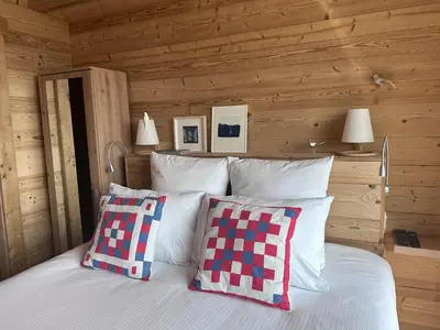 Un ou plusieurs lits dans un hébergement de l'établissement Chalet La Petite Ourse
