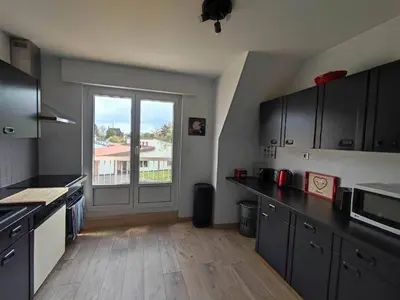 Cuisine ou kitchenette dans l'établissement GITE W