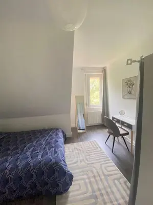 Un ou plusieurs lits dans un hébergement de l'établissement Appartement Cosy à Colmar