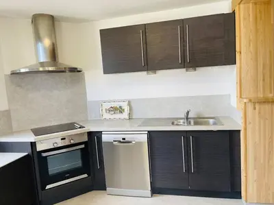 Cuisine ou kitchenette dans l'établissement Gîte du Charme - atypique et chaleureux