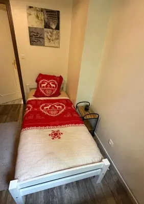 Un ou plusieurs lits dans un hébergement de l'établissement Appartement La Vanne Confortable et équipé