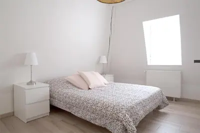Un ou plusieurs lits dans un hébergement de l'établissement Petite Venise Grand Duplex Turenne Hyper Centre