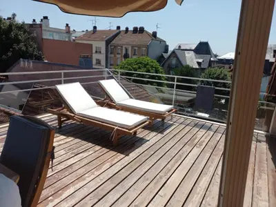 Balcon ou terrasse dans l'établissement Appartement-terrasse parking privé Meublé de Tourisme 4 étoiles