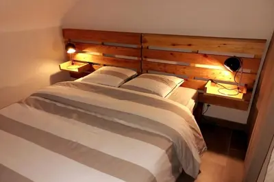 Un ou plusieurs lits dans un hébergement de l'établissement Appartement-terrasse parking privé Meublé de Tourisme 4 étoiles