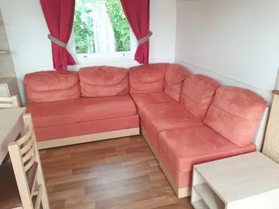 Coin salon dans l'établissement Camping Pré Vologne