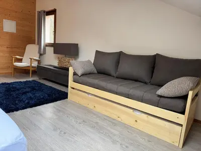 Coin salon dans l'établissement L'entre 2 Lacs
