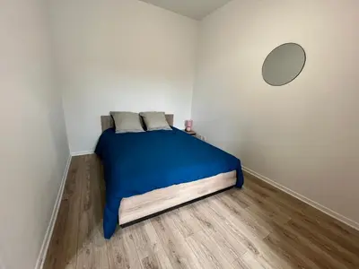 Un ou plusieurs lits dans un hébergement de l'établissement Appartement centre-ville de Lure gauche