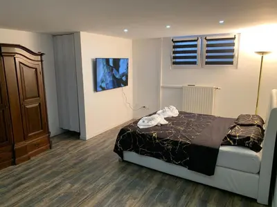 Un ou plusieurs lits dans un hébergement de l'établissement Studio 45m2 très calme