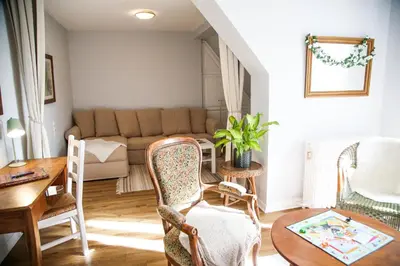 Coin salon dans l'établissement Villa Camélias, appartements de Charme