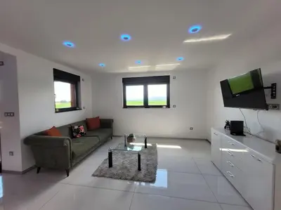 Télévision ou salle de divertissement dans l'établissement Cocon zen et confortable à proximité de Colmar
