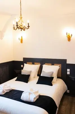 Un ou plusieurs lits dans un hébergement de l'établissement Domaine La Grange Ungersheim - Chambres d'Hôtes L'Inspiration