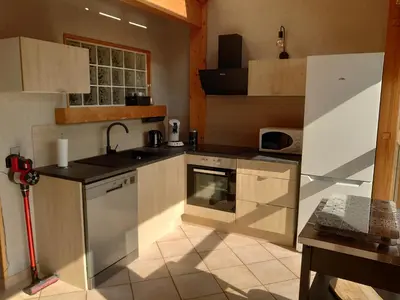 Cuisine ou kitchenette dans l'établissement Grand Appartement à Gerardmer