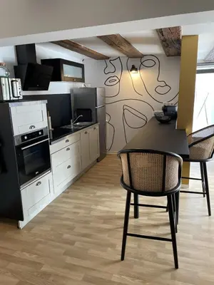 Cuisine ou kitchenette dans l'établissement Gite Pomme de Reinette