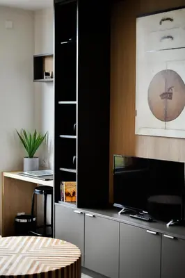 Télévision ou salle de divertissement dans l'établissement Appartements de Manon au cœur des vignes