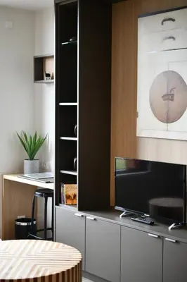 Télévision ou salle de divertissement dans l'établissement Appartements de Manon au cœur des vignes