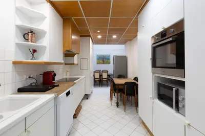 Cuisine ou kitchenette dans l'établissement La Maison de maître - centre historique - 3 rue henriette