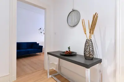 Coin salon dans l'établissement At Home in Colmar - City center