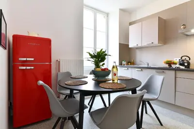 Cuisine ou kitchenette dans l'établissement At Home in Colmar - City center
