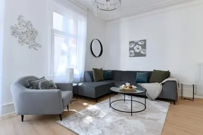 Coin salon dans l'établissement At Home in Colmar - City center