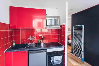 Cuisine ou kitchenette dans l'établissement Studio cosy proche centre-ville et gare