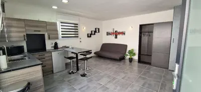 Cuisine ou kitchenette dans l'établissement AU PETIT CANAL DE COLMAR 1