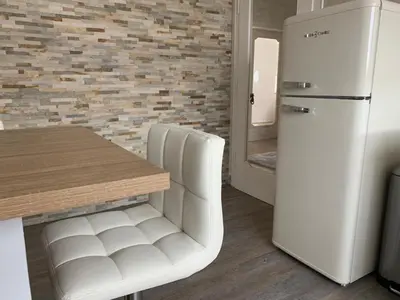 Cuisine ou kitchenette dans l'établissement BONNE IDEE - Suite GEORGES - Meublé de tourisme 4 étoiles