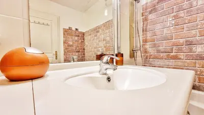 Salle de bains dans l'établissement Le Stan - Centre - Parking - Extérieur - Fibre - Relax BNB