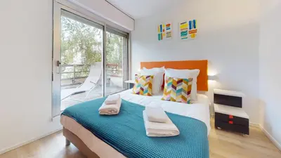 Un ou plusieurs lits dans un hébergement de l'établissement Maison Mandarine Colmar 5 bedrooms 180m2
