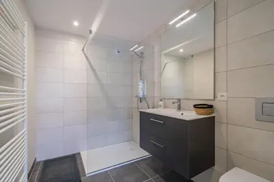 Salle de bains dans l'établissement Le Millésime de Sigo