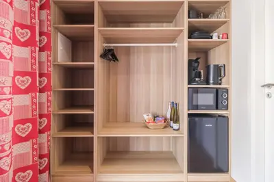 Cuisine ou kitchenette dans l'établissement Le Millésime de Sigo
