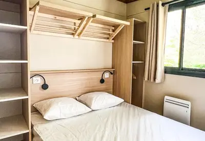 Un ou plusieurs lits dans un hébergement de l'établissement Camping Onlycamp Vauban