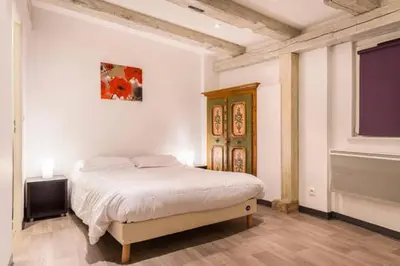 Un ou plusieurs lits dans un hébergement de l'établissement Historic city center - Petite Venise suites