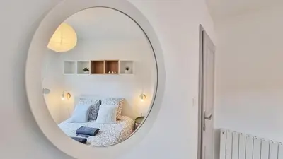 Un ou plusieurs lits dans un hébergement de l'établissement Chez Margot & Fawaz - Parking - 3 chambres - Jardin - Relax BNB