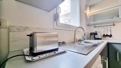 Cuisine ou kitchenette dans l'établissement Chez Margot & Fawaz - Parking - 3 chambres - Jardin - Relax BNB