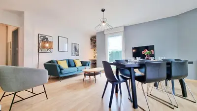 Coin salon dans l'établissement Chez Margot & Fawaz - Parking - 3 chambres - Jardin - Relax BNB